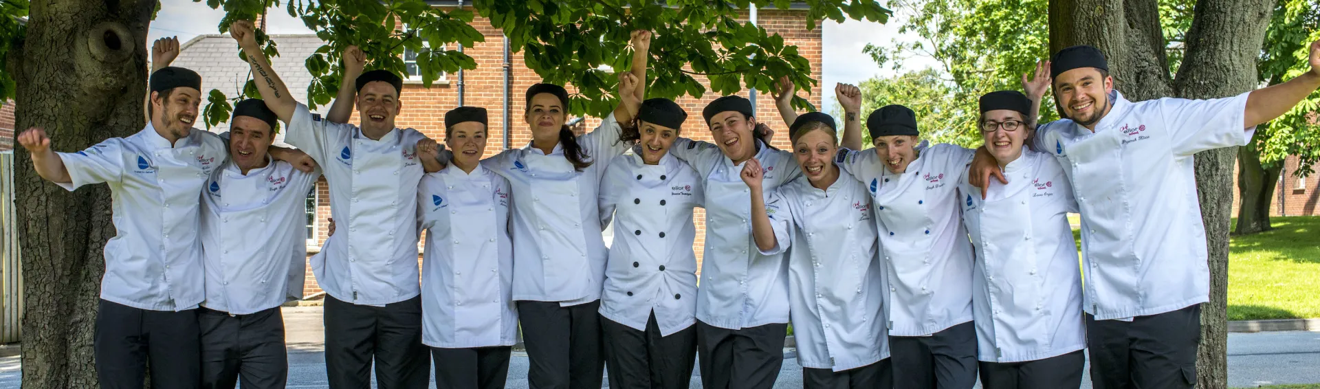 A group of Elior's chefs celebrating outside
