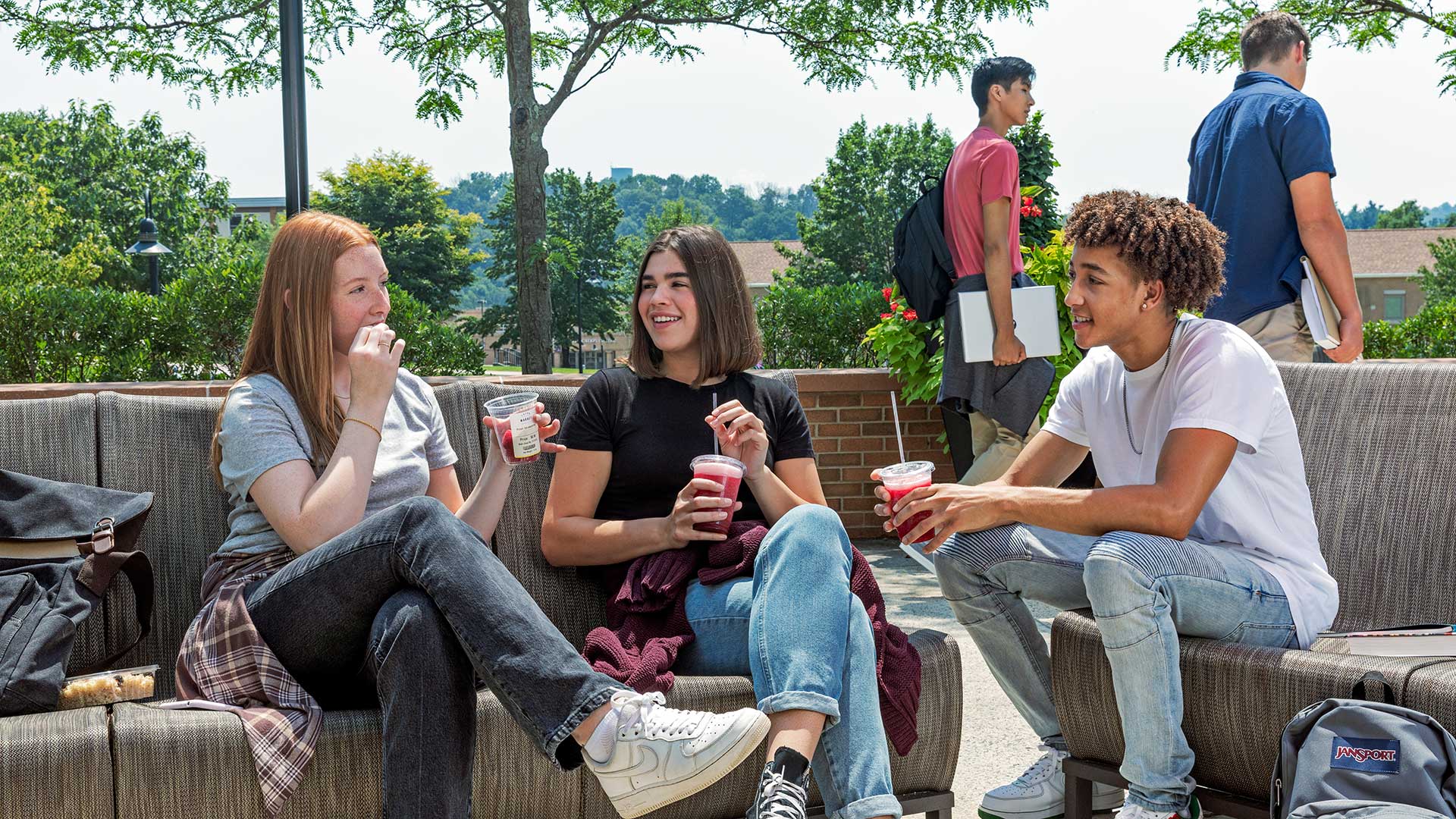 Students having beverages outside