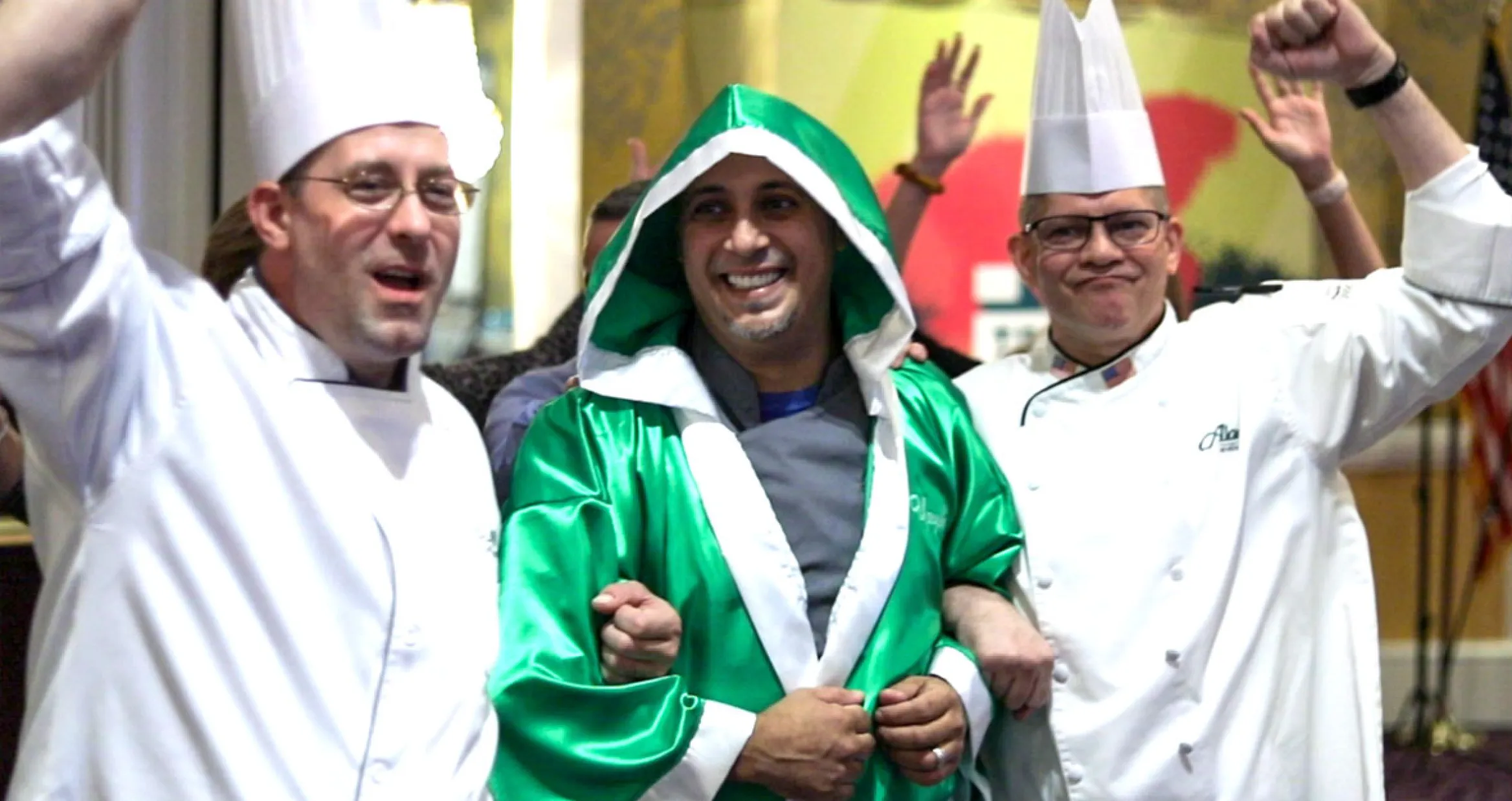 Chef Hector Ruiz walking in with Aladdin chefs