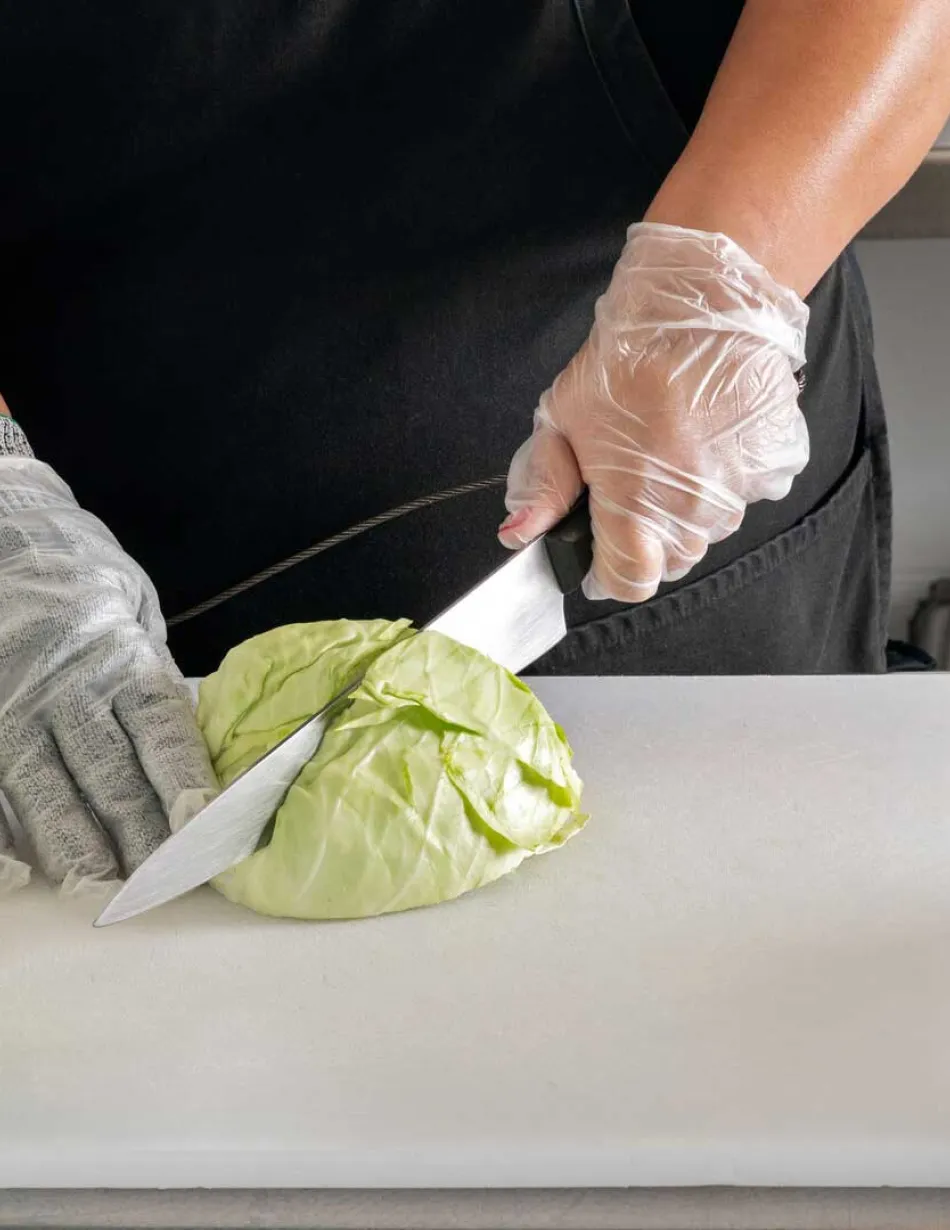 Cook cutting cabbage